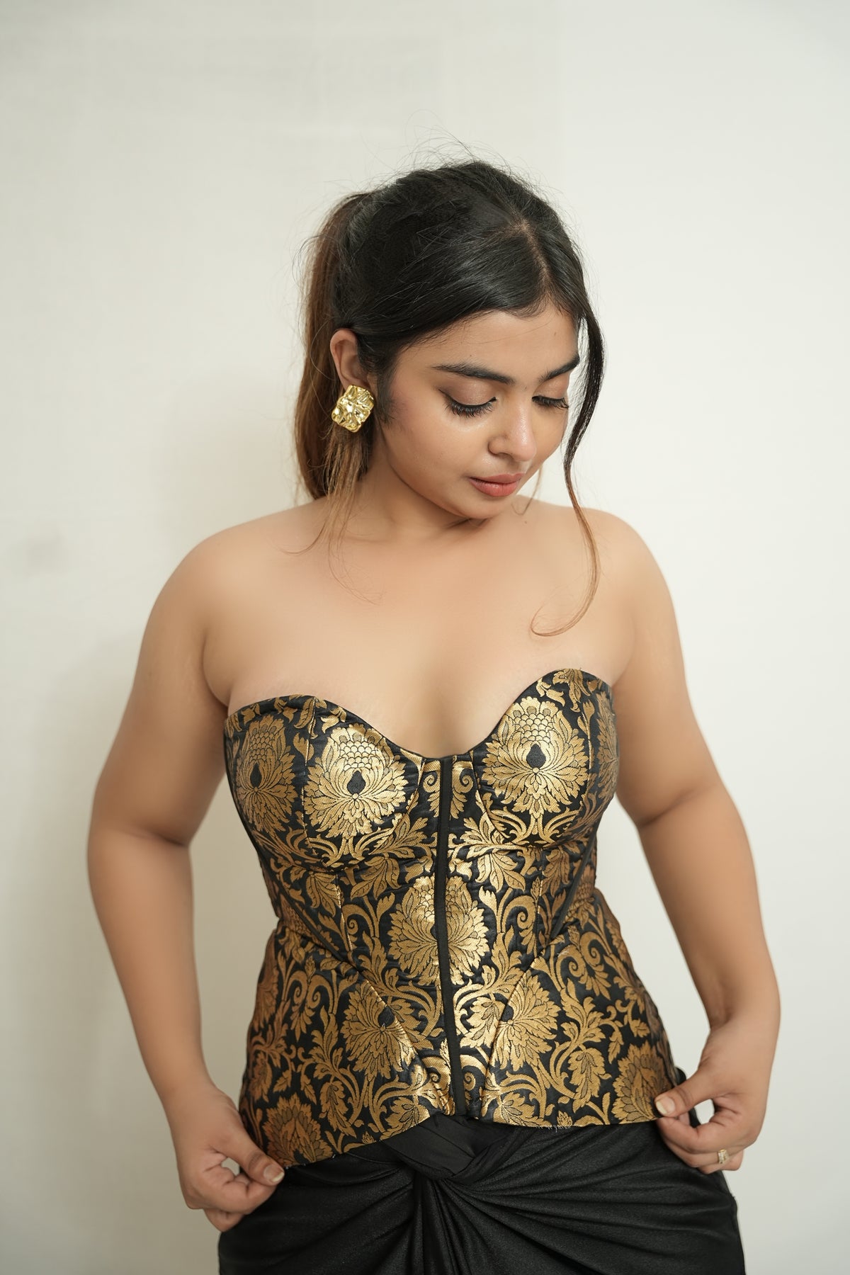 She became the moment | black and gold brocade corset